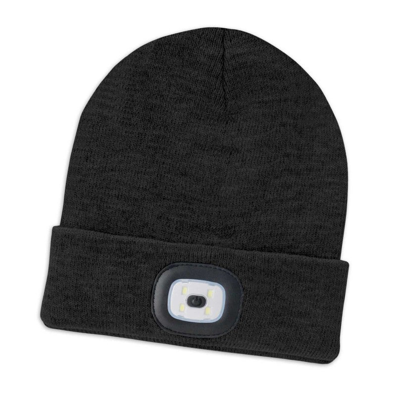 Warm knitted acrylic beanie with integrated rechargeable headlamp, featuring three adjustable lighting modes for outdoor use.