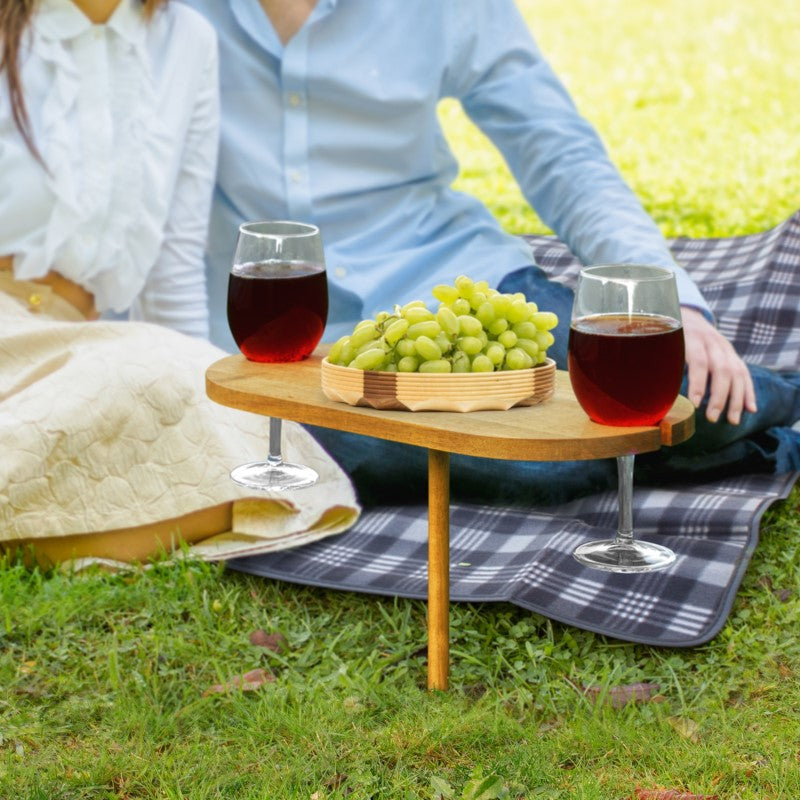 Picnic Wine Table made of acacia wood, featuring slots for two glasses and snack space, ideal for outdoor dining.