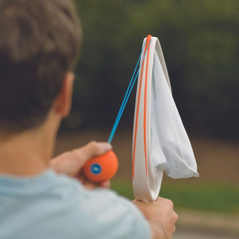 SlingBall Game with 2 rackets and 2 balls for engaging throw and catch fun suitable for all ages outdoors.
