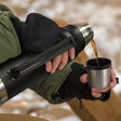 Stainless steel thermal flask with cup, double-walled insulation, BPA-free, powder-coated finish, and a portable carrying handle.