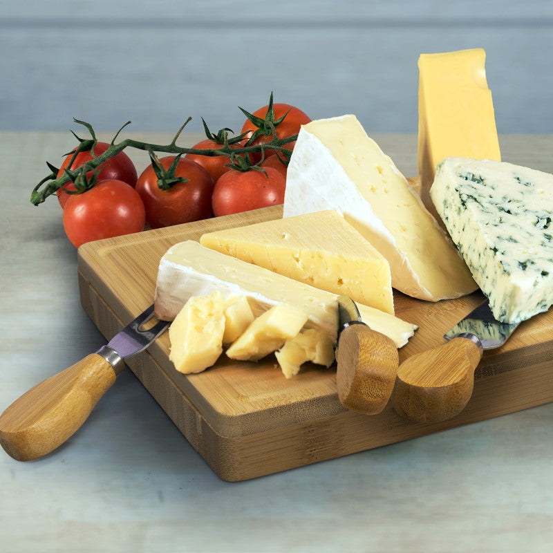 Elegant square bamboo cheese board with slide-out drawer, including 2 cheese knives and 1 fork, perfect for entertaining.