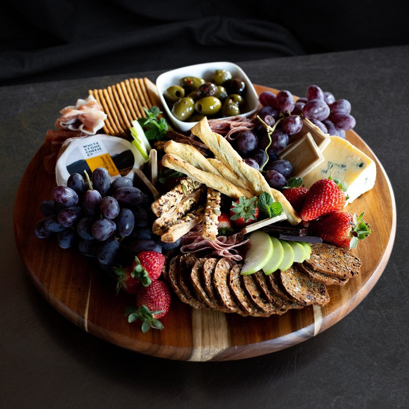 360-Degree Rotating Lazy Susan in premium acacia wood, perfect for effortless sharing of snacks during gatherings.