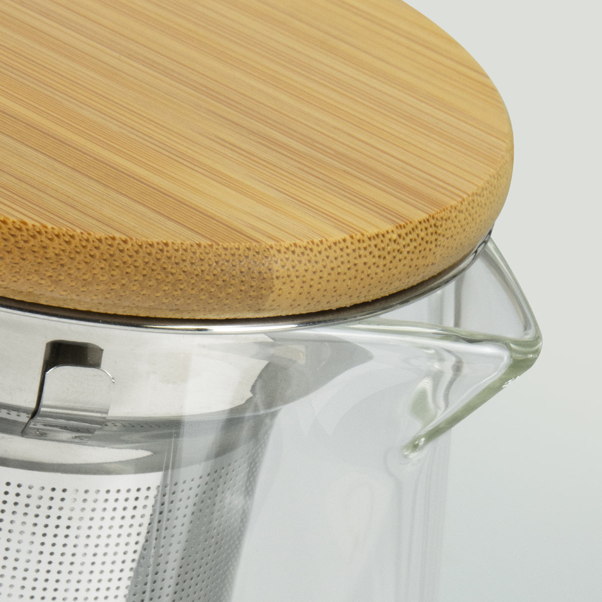 Elegant Infuser Teapot with removable stainless steel infuser, bamboo lid, 460ml capacity, perfect for tea enthusiasts.