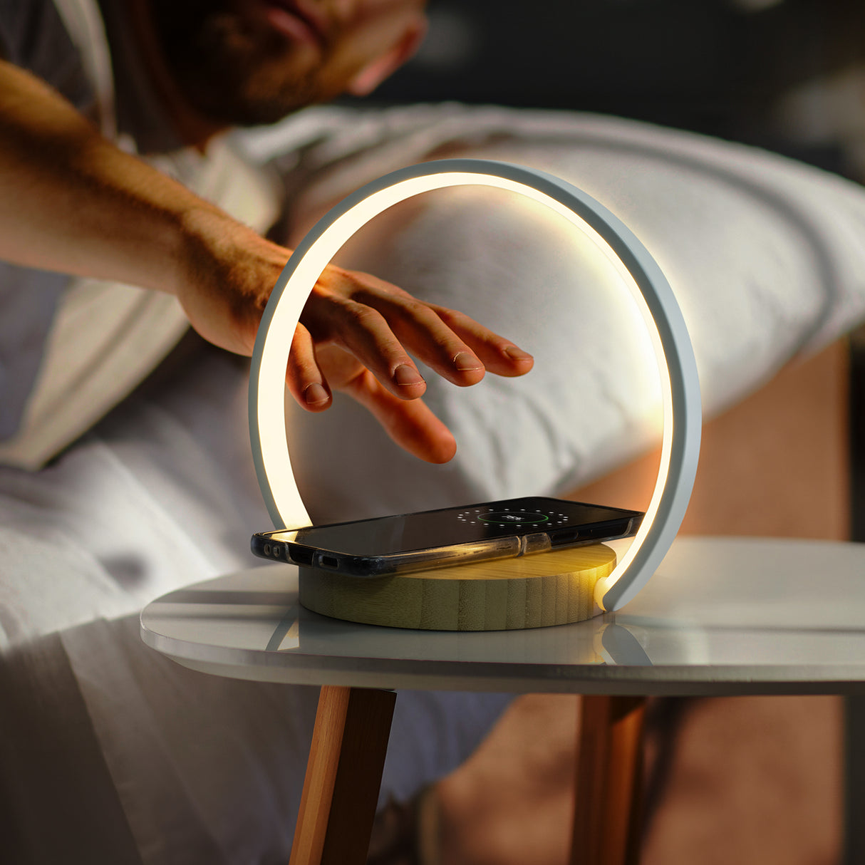 SereneGlow Wireless Charging Night Light with touch controls, unique bamboo design, and foldable for easy transport.