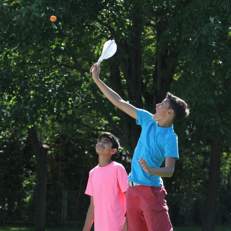 SlingBall Game by Djubi offers fun catch play with easy-to-use rackets and balls for all ages at outdoor events.