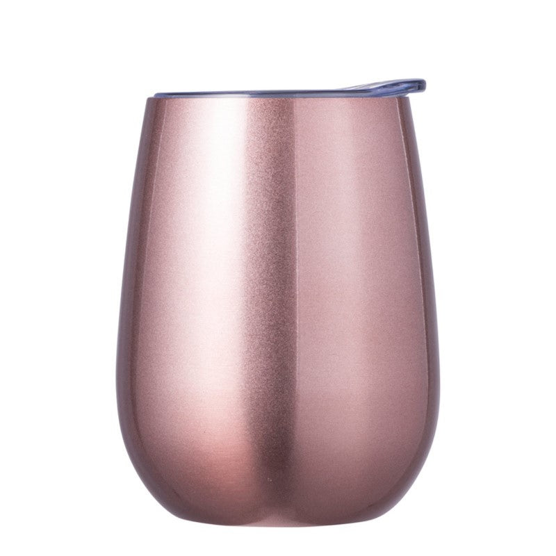 Double wall insulated rose gold wine tumbler (300ml) designed for hot/cold drinks, with spill-proof lid and sleek stemless style.