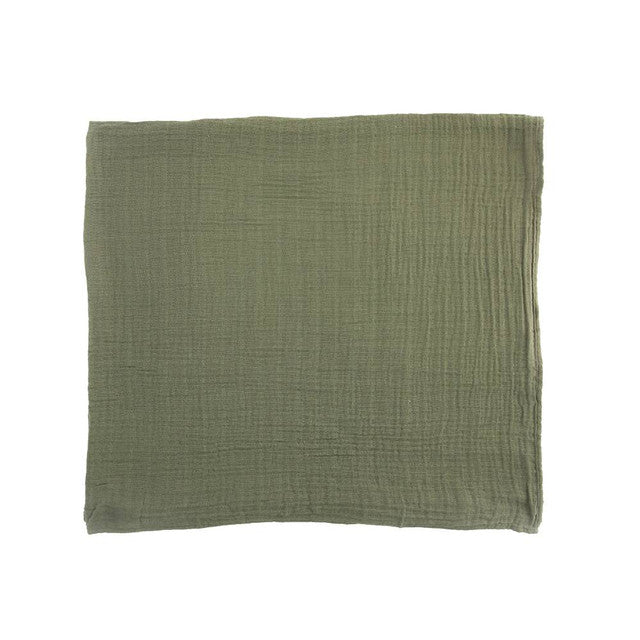 Lightweight cotton muslin swaddle in fern print, ideal for swaddling, nursing, and comfort for infants 0-3 months.