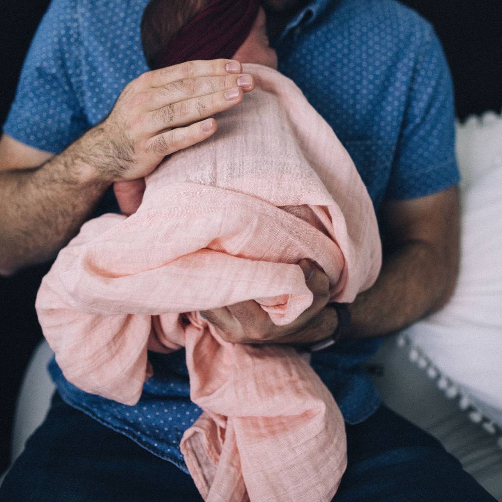 Lightweight rose petal cotton muslin swaddle, 120cm x 120cm, perfect for secure and breathable infant wrapping.