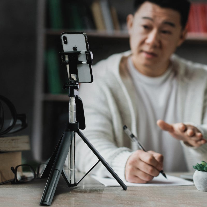 Universal Selfie Stick and 360 Degree Tripod, extending 150cm, featuring 360-degree rotation and Bluetooth remote for versatile photography.