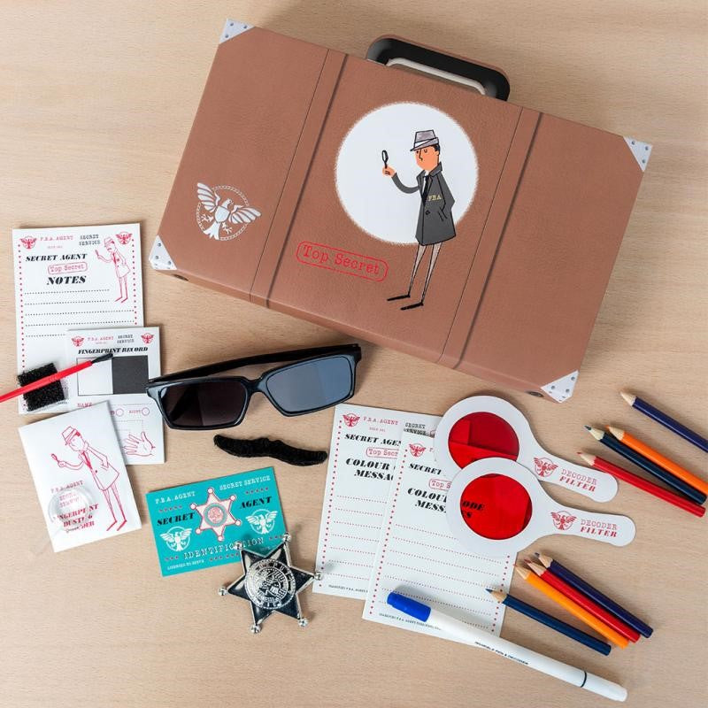 Children's detective kit featuring spy gear like coded messages, fingerprint tools, and a stylish briefcase for imaginative adventures.