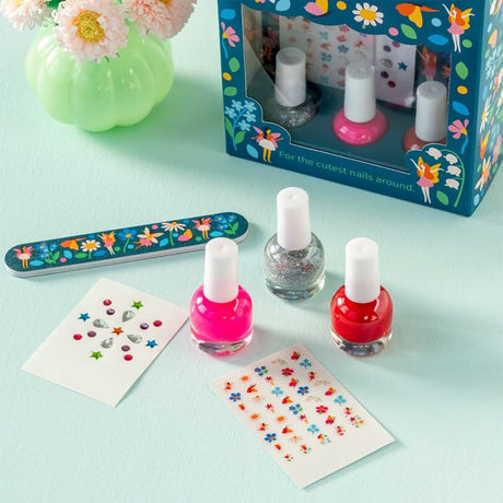 Whimsical Children's Nail Kit with non-toxic polishes, temporary tattoos, and stick-on gems for creative nail art fun.