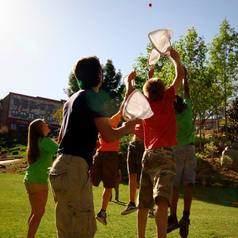 SlingBall Game with 2 rackets and balls for exciting catch fun at outdoor events, perfect for all ages and skill levels.