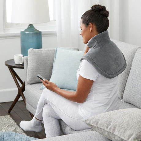 Shoulder & Neck Heating Pad designed for muscle relief, featuring five heat settings, adjustable collar, and machine-washable fabric.