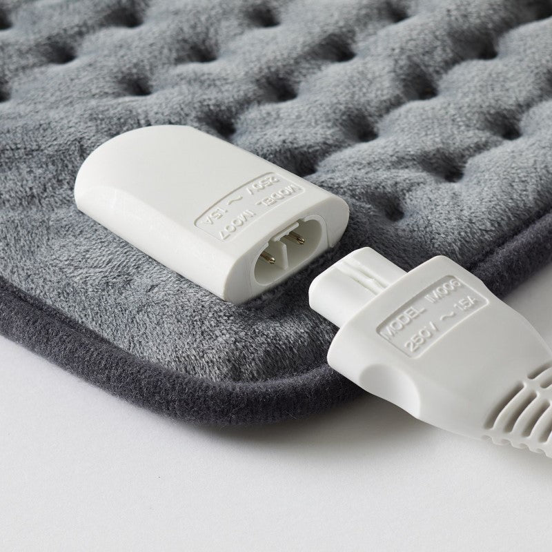 Shoulder & Neck Heating Pad offering adjustable warmth for muscle relief, with a secure fit and auto shut-off for safety.