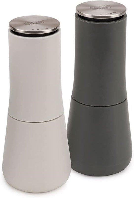 Elegant salt and pepper set with top grinding mechanism, ensuring no mess and easy refilling.