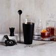 Luxury Cocktail Set with matte black finish, includes shaker, jigger, mixing glass, strainer, and stainless steel straws.