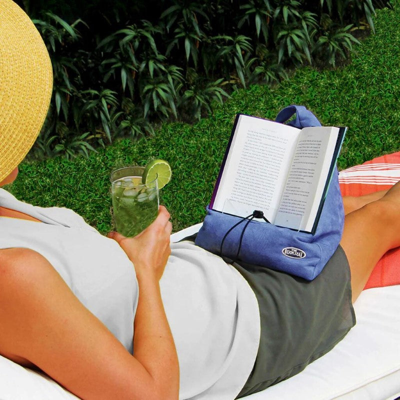 Comfortable and adaptive book holder for hands-free reading, suitable for all surfaces and devices like books and tablets.