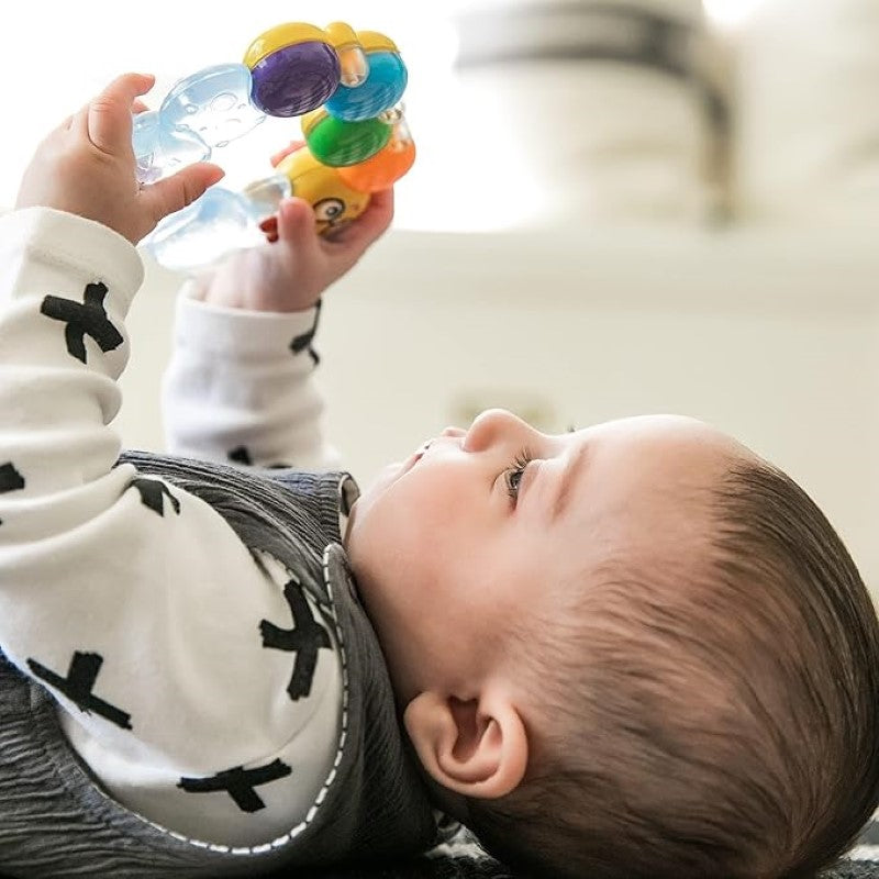 Caterpillar-shaped water-filled teether providing soothing relief for babies with sore gums, easy for little hands to grasp.