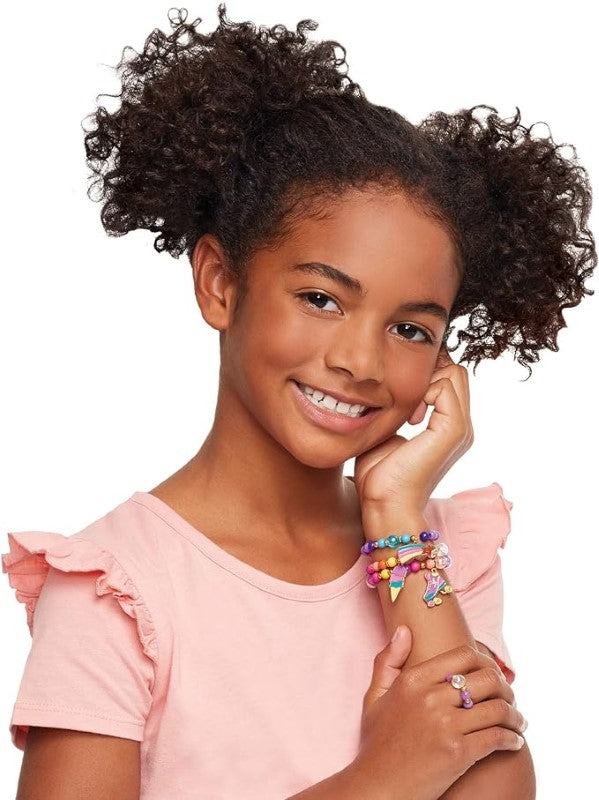 Colorful charm bracelet making kit featuring beads, elastic cord, and charms for creative jewelry design. Perfect for young crafters.