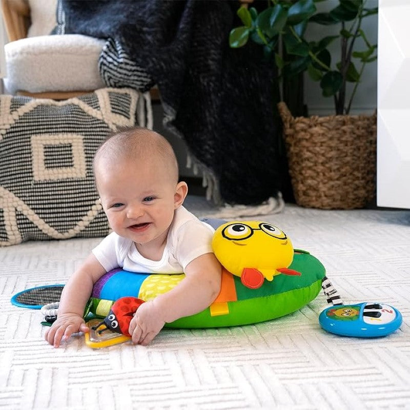 Baby Einstein Tummy Time Activity Pillow with 9 engaging toys, promoting sensory play and muscle development for infants.