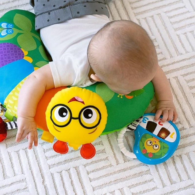 Colorful Tummy Time Activity Pillow with toys, mirror, and textured elements for sensory development in infants.