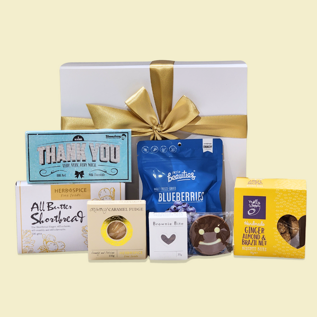 Elegant Appreciation Gift Box featuring gourmet treats, milk chocolate, shortbread, fudge, and artisan biscotti. Perfect for gratitude.