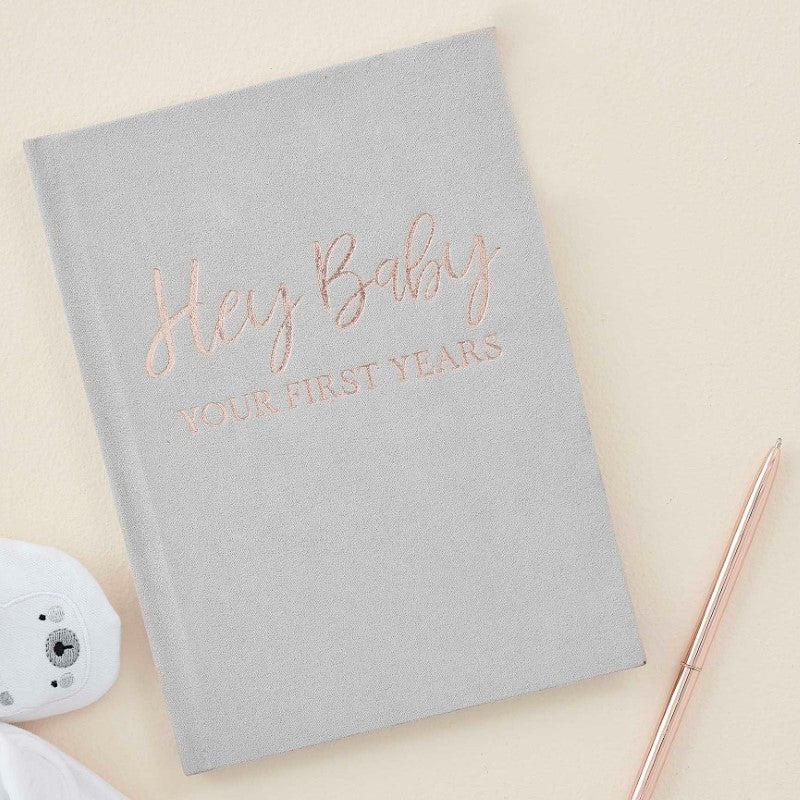 Elegant grey suede Baby Memory Journal Book with rose gold foiling for documenting precious baby milestones and memories.