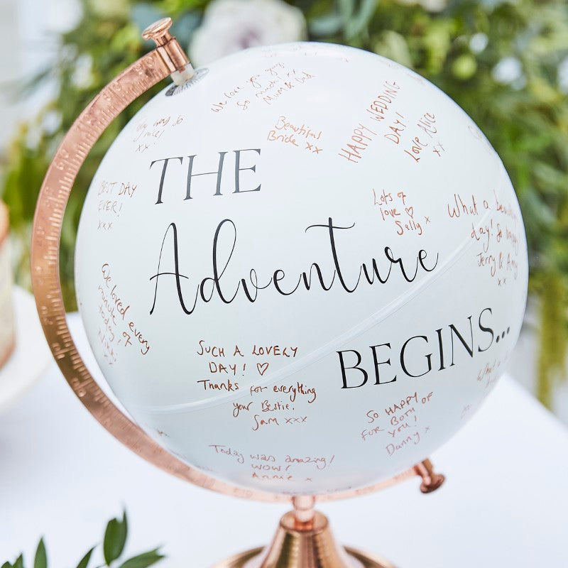 Wedding globe guest book alternative for guests to leave messages; elegant, interactive keepsake for weddings and anniversaries.