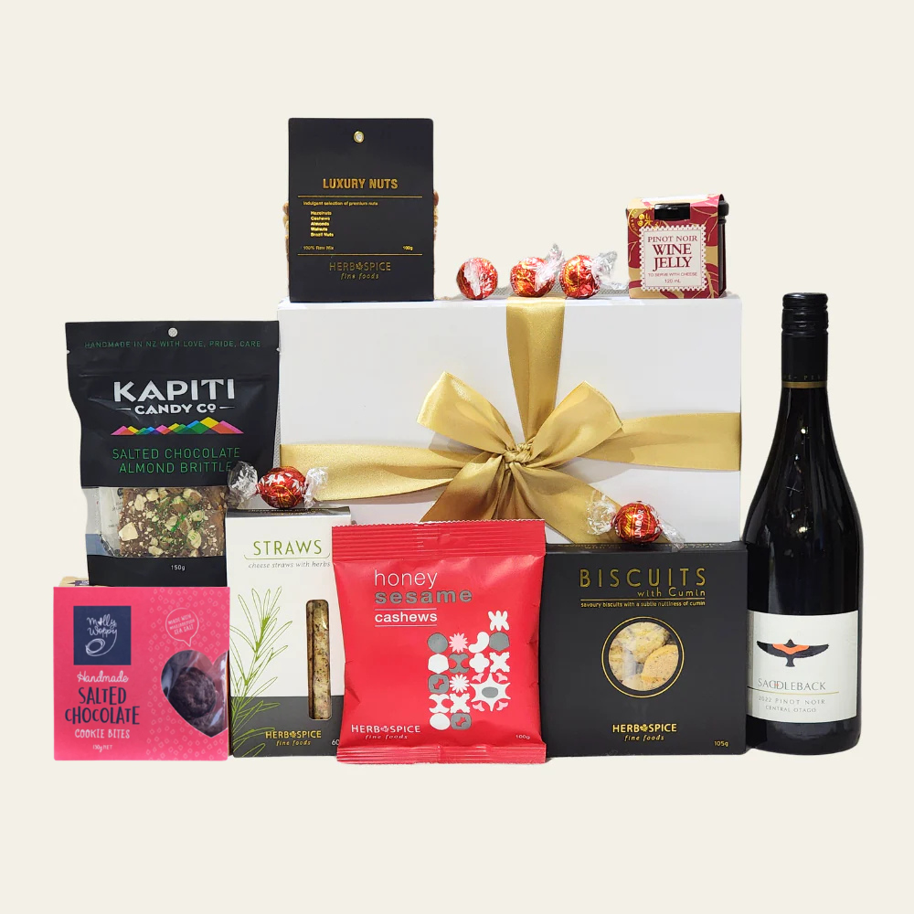 Luxurious gift box for Lunar New Year featuring wines, gourmet snacks, and confectionery, symbolizing abundance and joy.