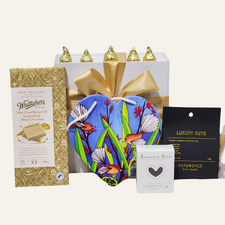 Fantail & Treats Gift Box featuring a ceramic fantail wall hanging and gourmet chocolates and snacks from New Zealand.