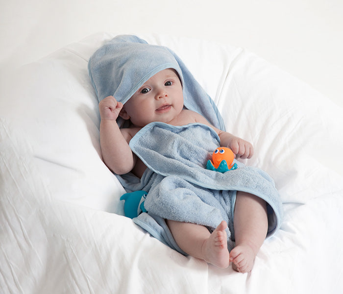 Soft blue baby hooded towel, ultra-absorbent, perfect for keeping newborns cozy and warm after bath time.
