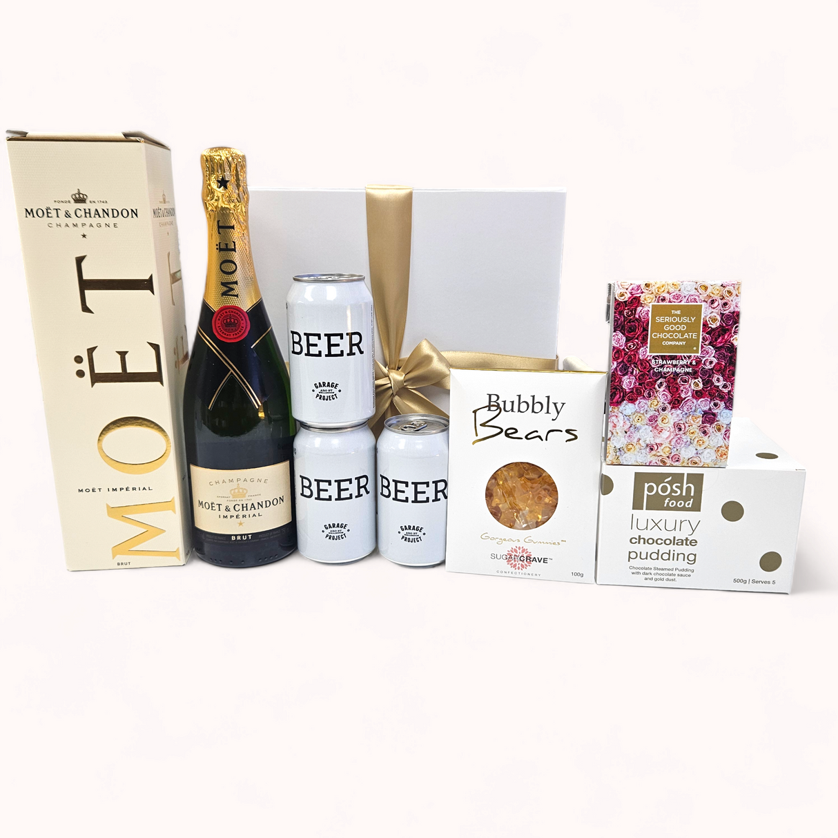 Elegant gift box featuring Moët champagne, luxurious treats, and premium beers for special celebrations.