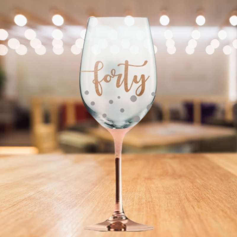 Hand-painted rose gold stem wine glass with "40 Happy Birthday" script, 430ml capacity, perfect for milestone celebrations.