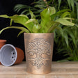Terracotta planter featuring the intricate Tree of Life design by Lisa Parker, finished in antiqued bronze, perfect for plants.