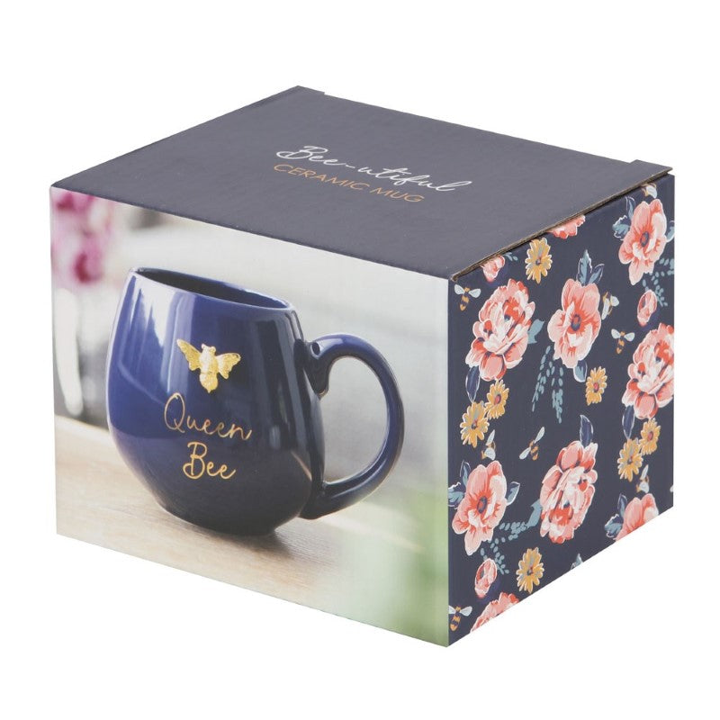 Navy blue Round Queen Bee Mug with gold "Queen Bee" lettering and bee design, perfect for a stylish beverage experience.