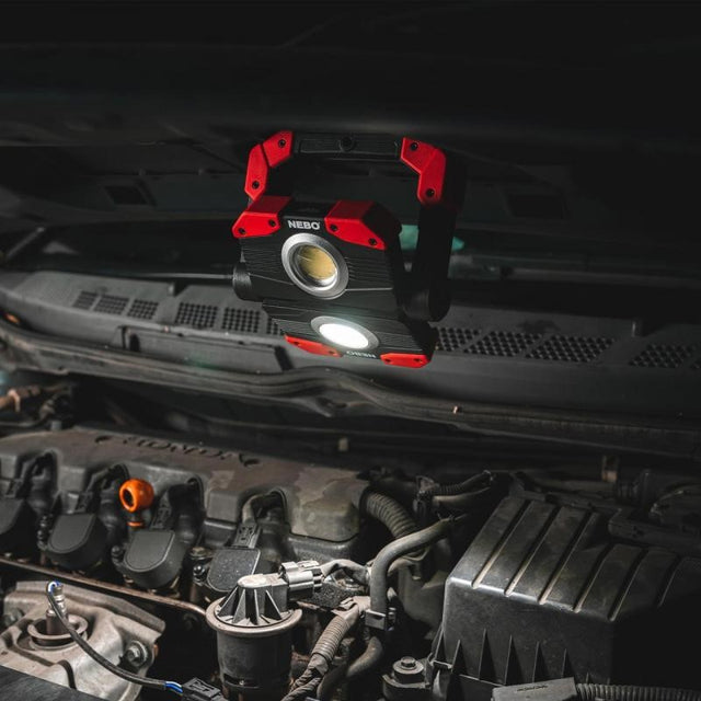 Bright 2000-lumen OMNI 2K work light with USB-C power bank, magnetic handles, and durable water-resistant design.