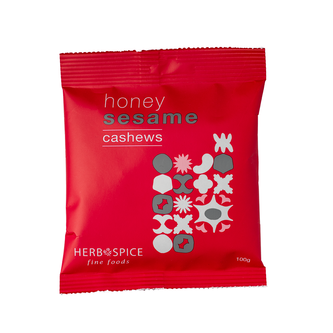 Gourmet Honey Sesame Cashews, roasted and glazed, combining sweet and salty flavors for a crunchy, indulgent snack.