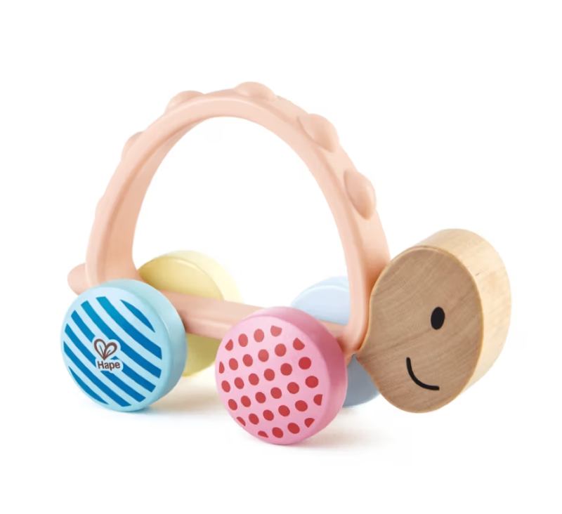 Colorful Wooden Turbo Turtle toy with patterned wheels, silicone handle for young children’s interactive play and motor skill development.