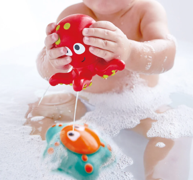 Colorful ocean squirters featuring an octopus and starfish, perfect for playful bath time fun for babies 12 months and up.