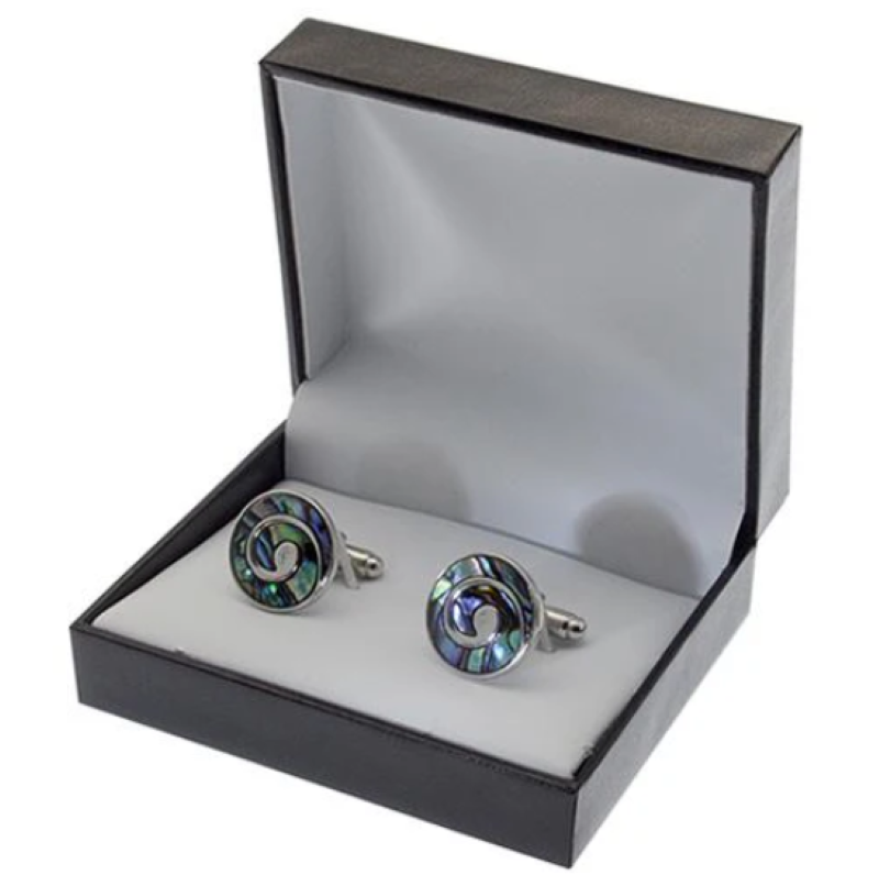 Handcrafted Paua shell cufflinks featuring a unique Koru motif, symbolizing growth and ideal for any special occasion.