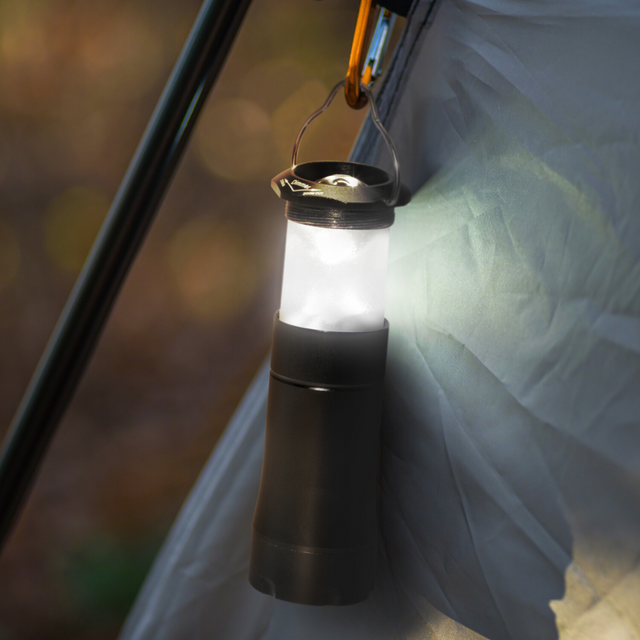 Dual-function flashlight lantern with sturdy handle, includes batteries, and features elegant laser engraving for outdoor use.