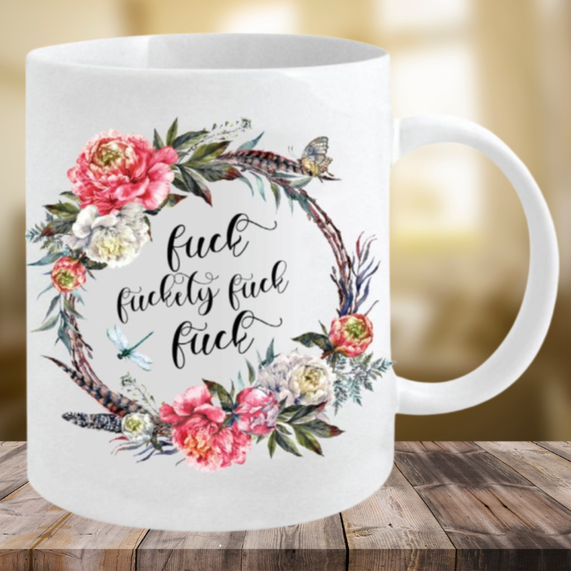 Cheeky floral mug featuring a playful message, perfect for adding humor to your morning coffee or tea.