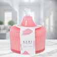 Keri Scented Candle in light pink jar, featuring refreshing Lotus Water fragrance for a calming ambiance and elegant decor.