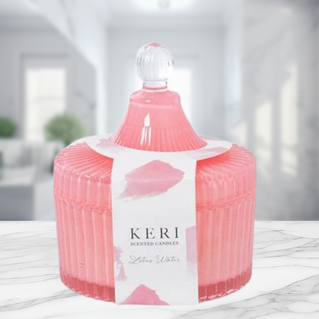 Keri Scented Candle in light pink jar, featuring refreshing Lotus Water fragrance for a calming ambiance and elegant decor.