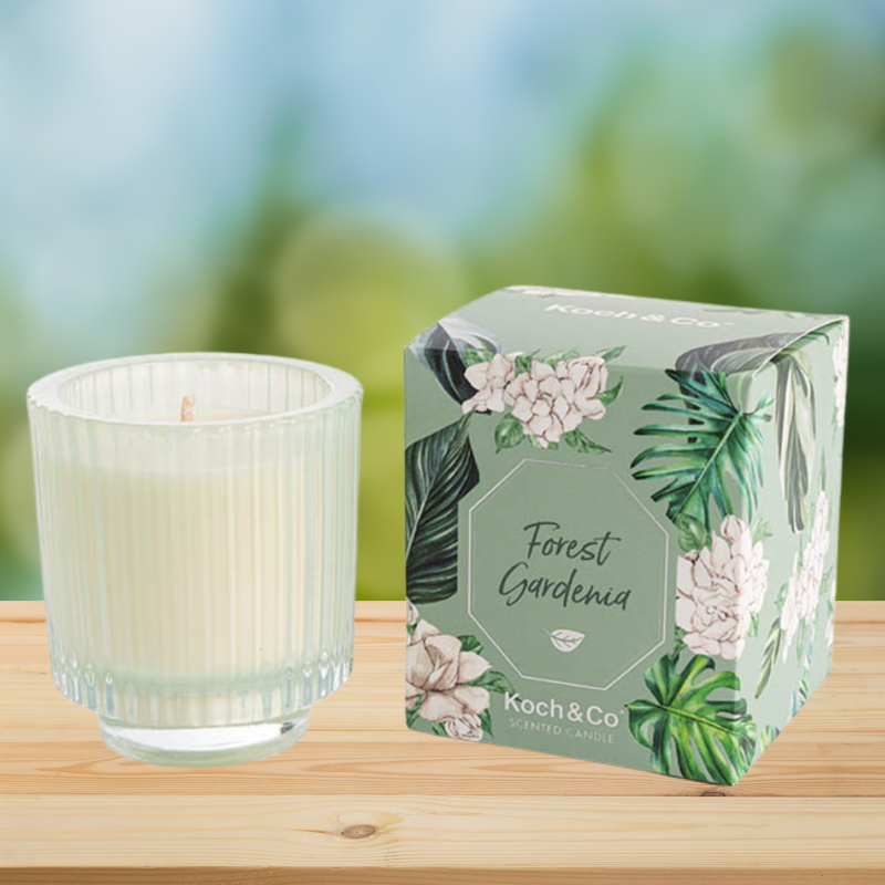Scented Gardenia Candle in elegant ripple-patterned glass, offering 30 hours of soothing fragrance for home ambiance.