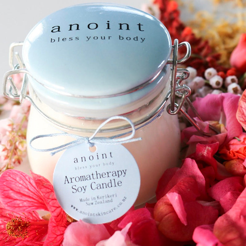 Calming soy candle infused with essential oils and crystals for deep relaxation and tranquility.