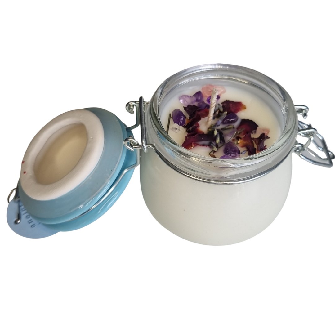 Calming soy candle with essential oils and crystals for deep relaxation and tranquility in your space.