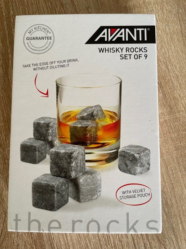 Whisky Rocks Set featuring 9 eco-friendly soapstone rocks and a velvet pouch for chilled spirits without dilution.