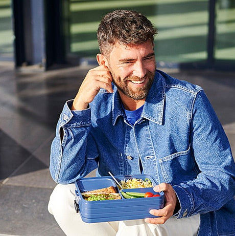 Large bento box with multiple compartments, microwave-safe, BPA-free, ideal for diverse meals at home or on the go.