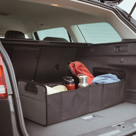 Durable trunk organiser with three compartments and 40L capacity for neat and secure car storage.